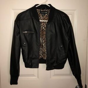 Leather jacket with cheetah print on inside